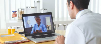 A doctor being coached online