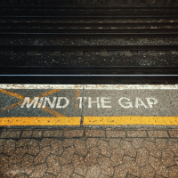 Mind the gap warning beside railtrack