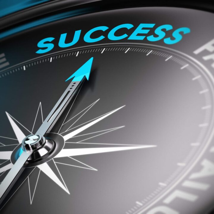 Compass pointing to success